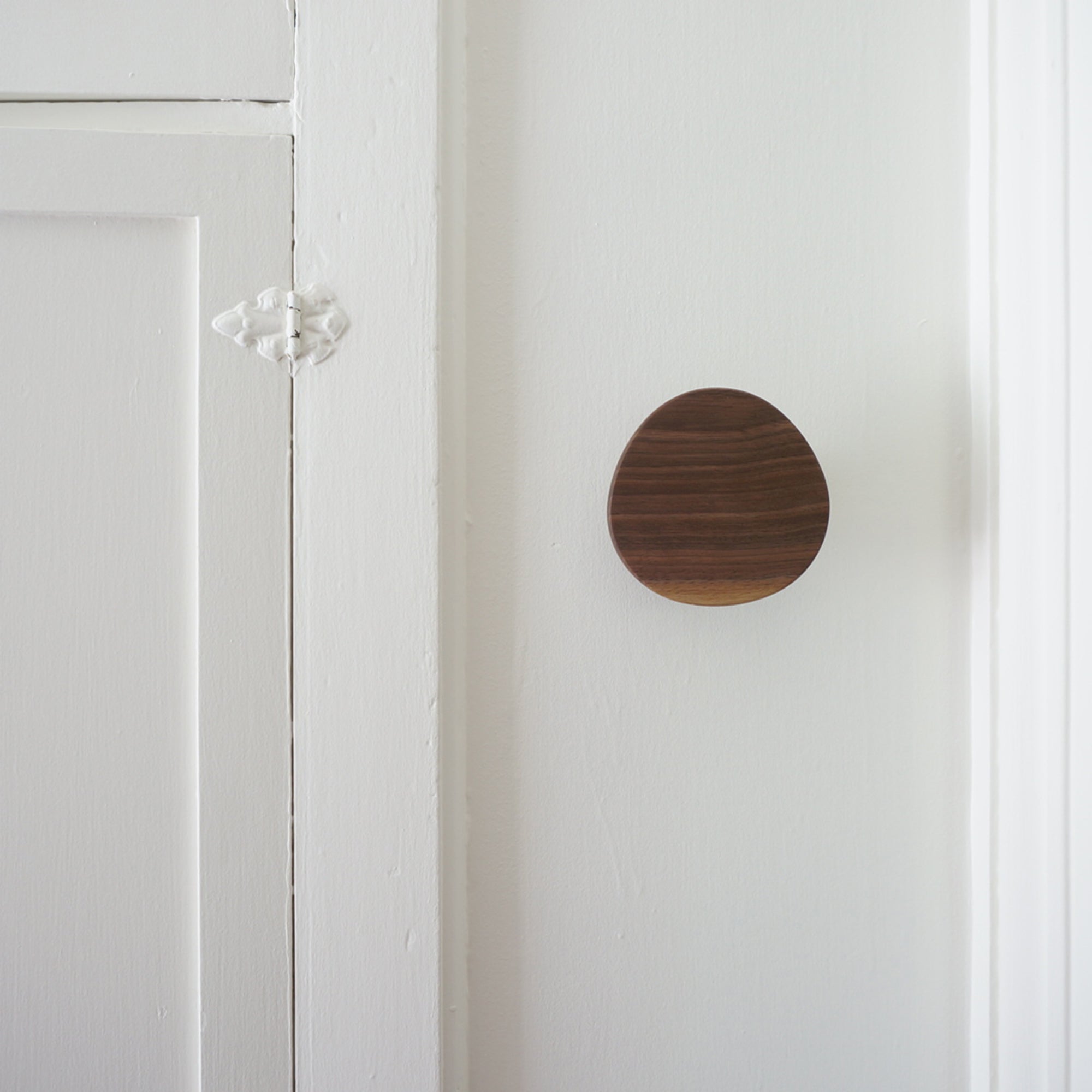 Triangle wood wall hook in Walnut