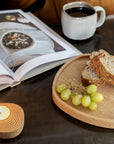 solid wood tray and ceramic coffee cup with hand made candle holder in white oak made in canada